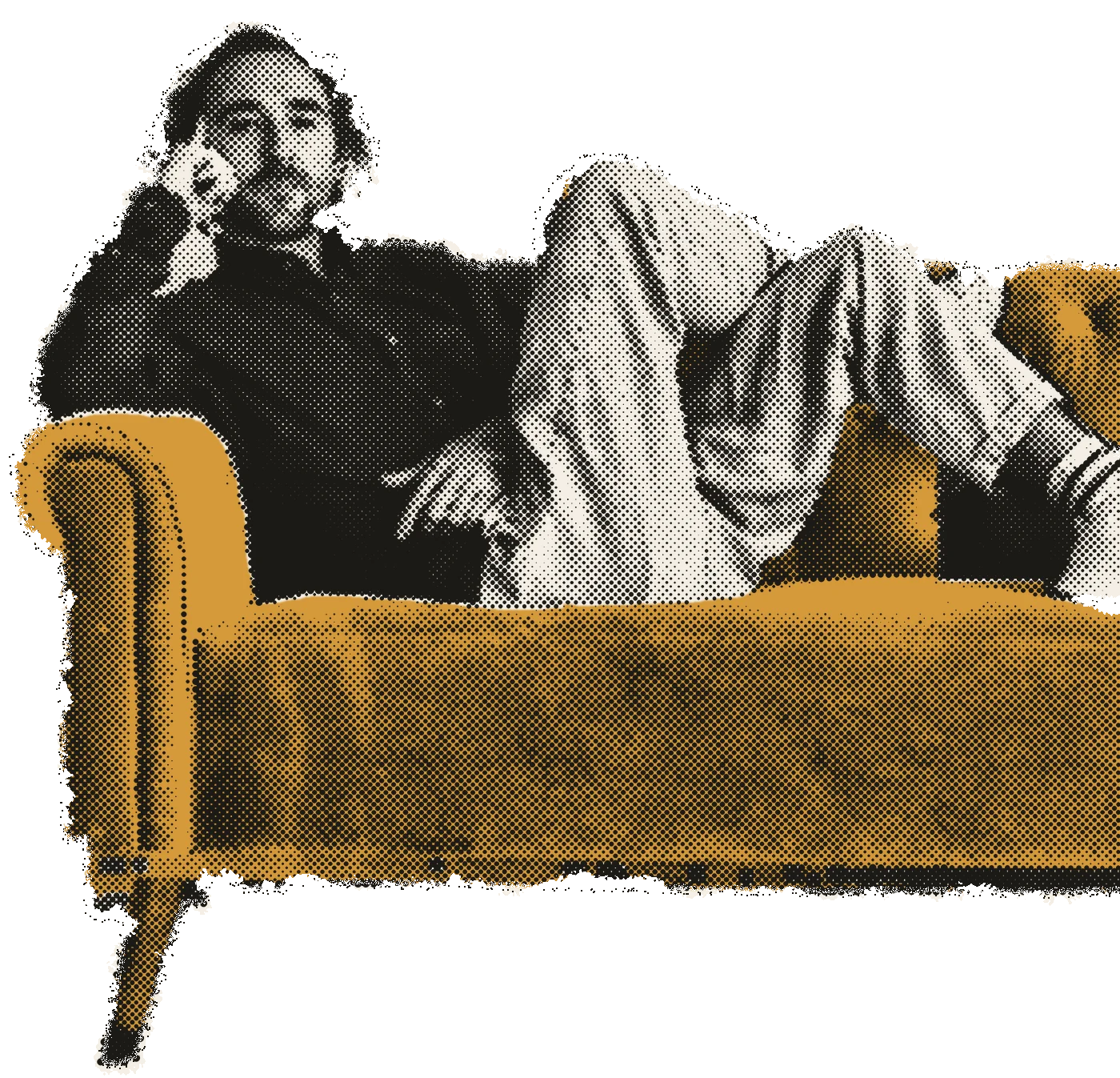 Ben Forman reclining on a mustard velvet sofa